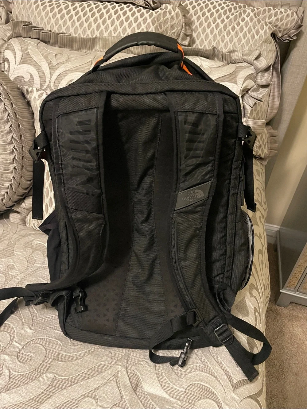 The North Face Orange and Black Backpack
